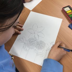 girl drawing flowers