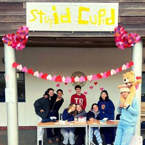 Students at a Valentine's themed event named Stupid Cupid