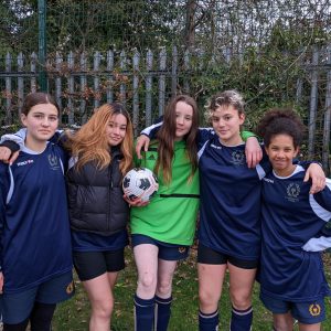 Students in their football kit