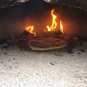 fire inside a pizza oven