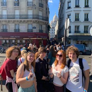 Smiling students in the streets in Paris