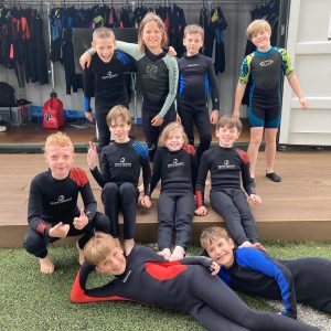Students in wetsuits ready for their day of activities
