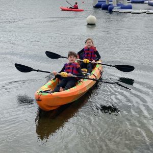 2 students in a canoe