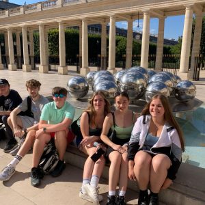 Students sat in the sun at the museum