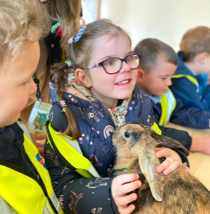 children with a bunny rabbit